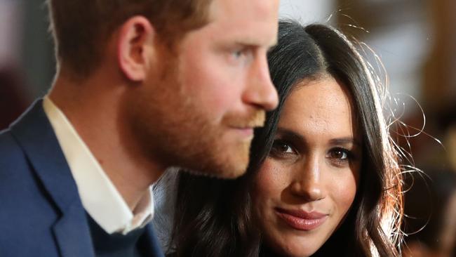 EDINBURGH, SCOTLAND - FEBRUARY 13:  Prince Harry and Meghan Markle attend a reception for young people at the Palace of Holyroodhouse on February 13, 2018 in Edinburgh, Scotland.  (Photo by Andrew Milligan - WPA Pool/Getty Images)