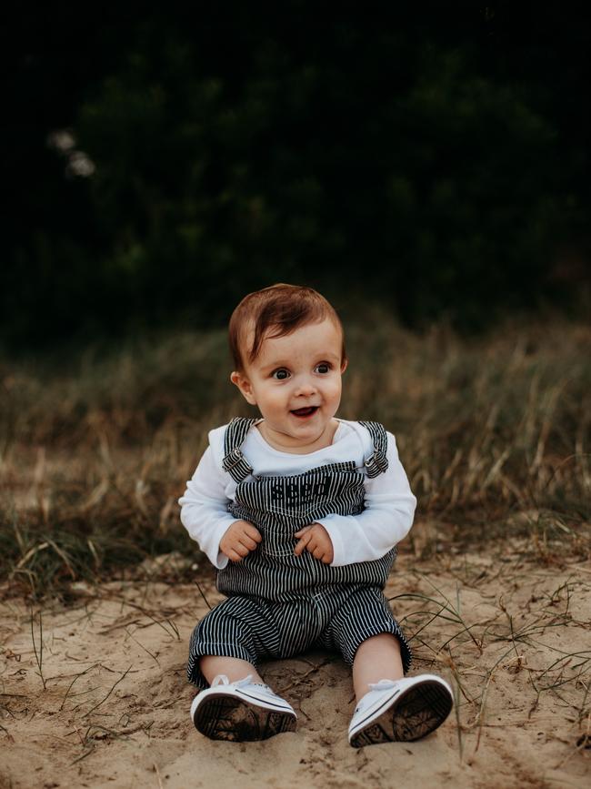 Austin West. 8.5 months. Austin loves to talk (in baby language) he is so happy and loves meeting new people (most of the time). He is obsessed with dogs especially his labrador and miniature schnauzer he gets so excited when we see dogs out on our walks , shopping etc, Funny moment: he dropped the middle finger in his first Christmas photo with Santa