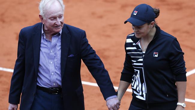 The new champion with tennis legend Rod Laver. Picture: AP