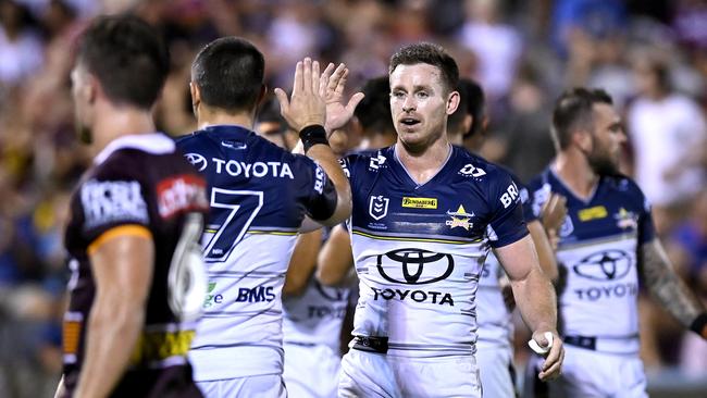 BRISBANE, AUSTRALIA - FEBRUARY 27: Michael Morgan and Jake Clifford of the Cowboys celebrate during the NRL Trial Match between the Brisbane Broncos and the North Queensland Cowboys at Moreton Daily Stadium on February 27, 2021 in Brisbane, Australia. (Photo by Bradley Kanaris/Getty Images)