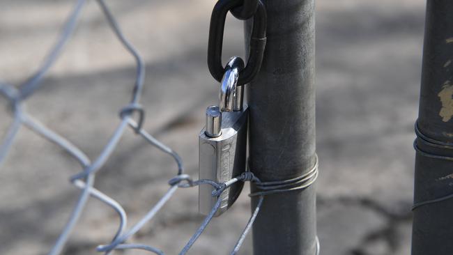 A broken padlock at a business in Padstow. Picture: AAP Image/Brendan Esposito