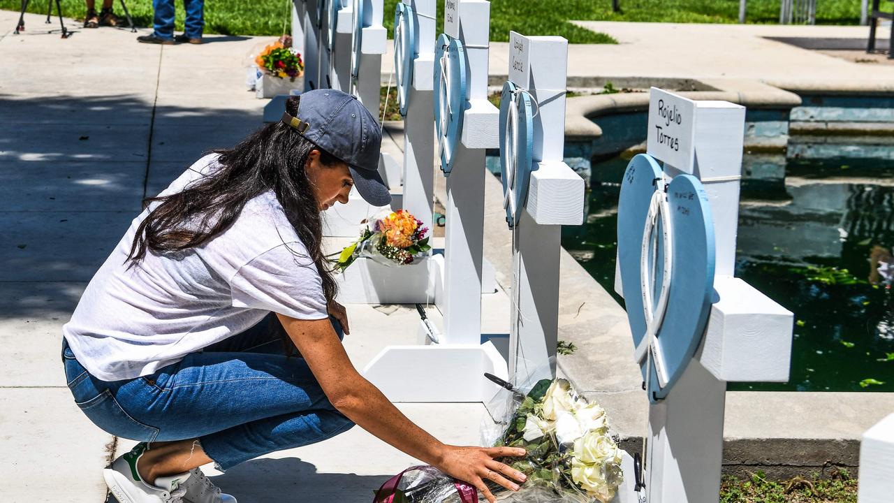 Meghan Markle lays flowers in Uvalde, Texas but is yet to visit her estranged dad suffering from a stroke just hours from her California home. Picture: AFP.