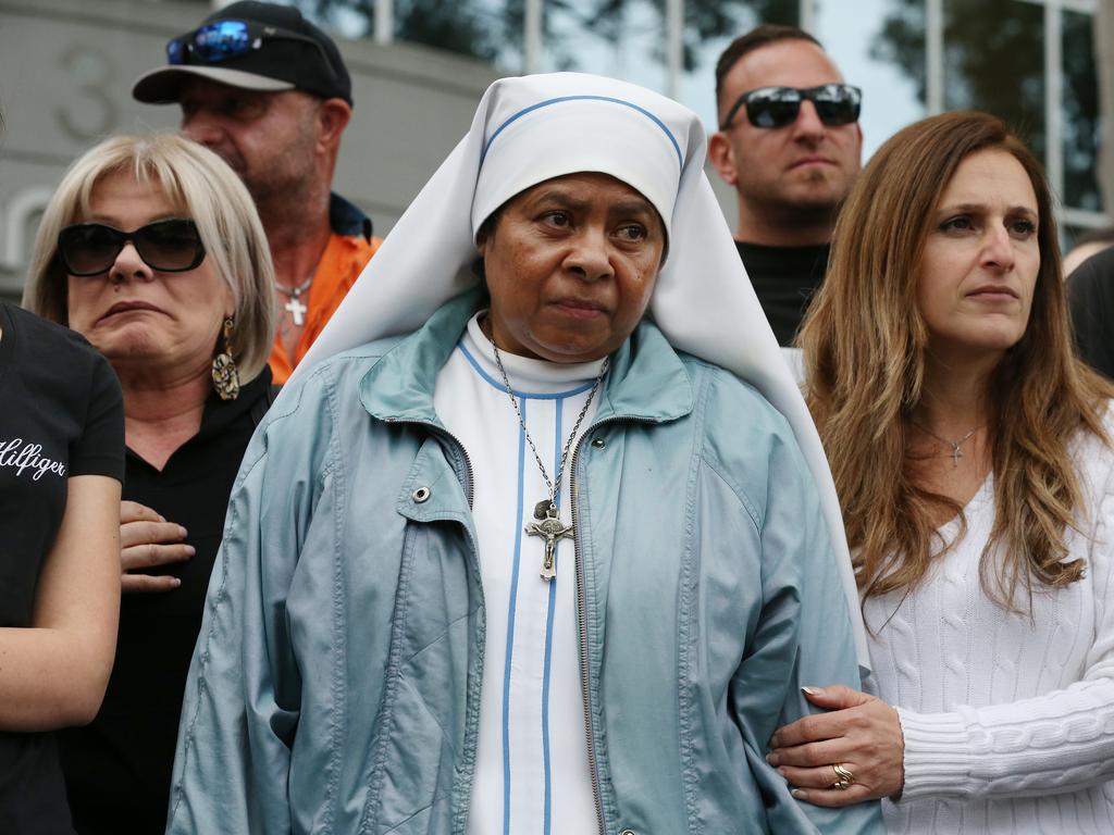 Protestors have begun to gather outside Kiis FM headquarters in North Ryde to protest against comments Kyle Sandilands made about Christians and the Virgin Mary. Protest leader Georgie Mark speaks to the protestors. Picture: David Swift.