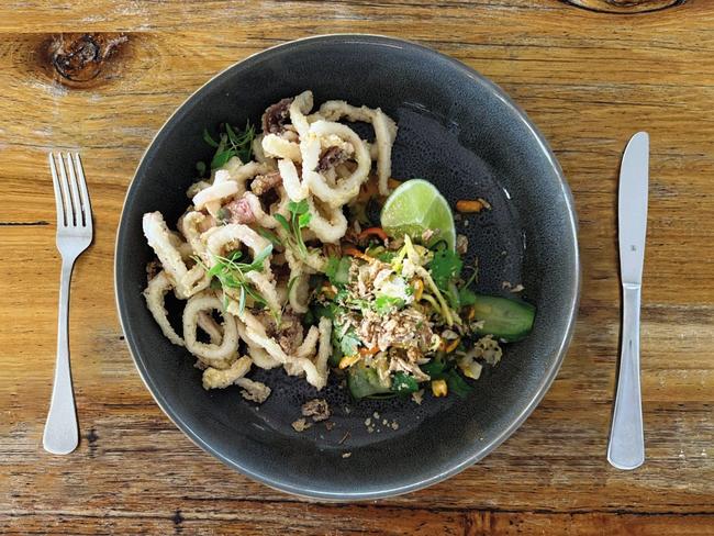 Szechuan pepper squid, green mango salad, chilli dressing.