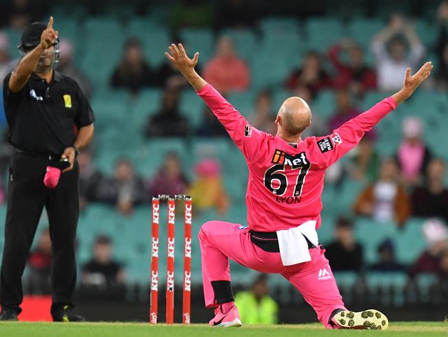 Nathan Lyon of the Sixers successfully appeals for the LBW wicket of Ben Dunk of the Stars during the Big Bash League (BBL) cricket Final between the Sydney Sixers and Melbourne Stars at the SCG in Sydney, Saturday, February 8, 2020. (AAP Image/Dean Lewins) NO ARCHIVING, EDITORIAL USE ONLY, IMAGES TO BE USED FOR NEWS REPORTING PURPOSES ONLY, NO COMMERCIAL USE WHATSOEVER, NO USE IN BOOKS WITHOUT PRIOR WRITTEN CONSENT FROM AAP