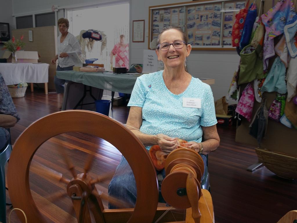 Valley Spinners member Ann Dittmar spinning yarn for one of her projects.