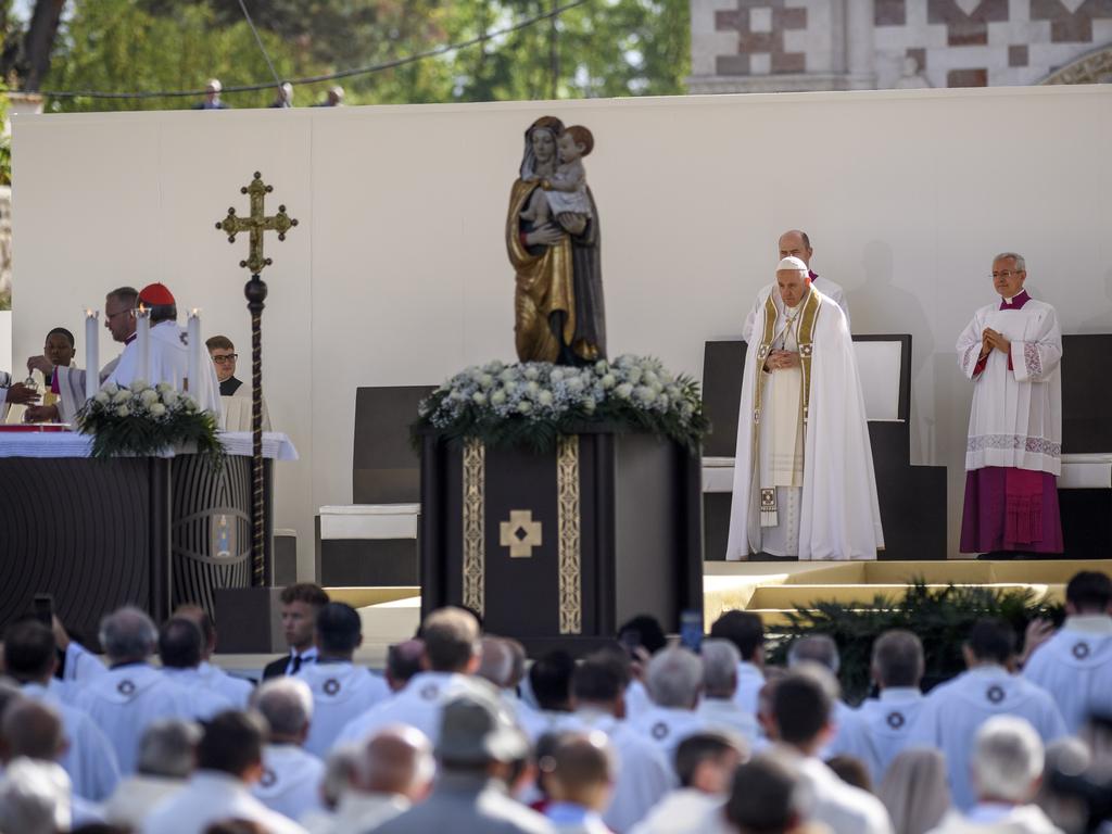 Pope Francis leads the mass before the Rite of Opening at the Basilica of Santa Maria di Collemaggio in L'Aquila, Italy. Picture: Getty Images