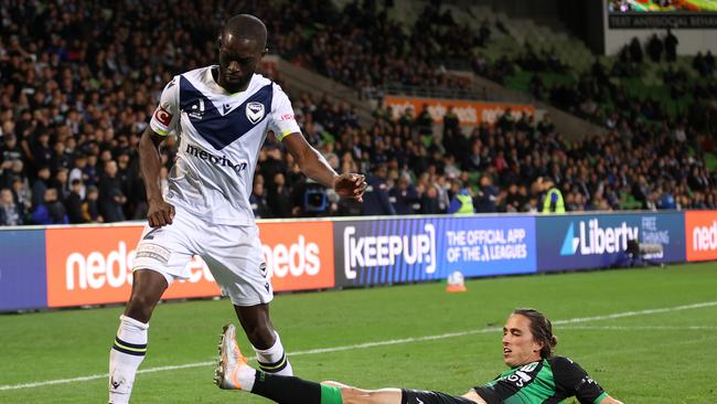 Melbourne Victory’s Jason Geria (left) is tackled by Western United’s Lachie Wales during the Victory’s 1-0 first-leg semi-final win. Picture: Robert Cianflone/Getty Images