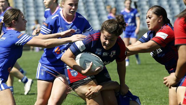 Campbelltown Collegians' Belinda Vakarewa is tackled. Picture: John Appleyard