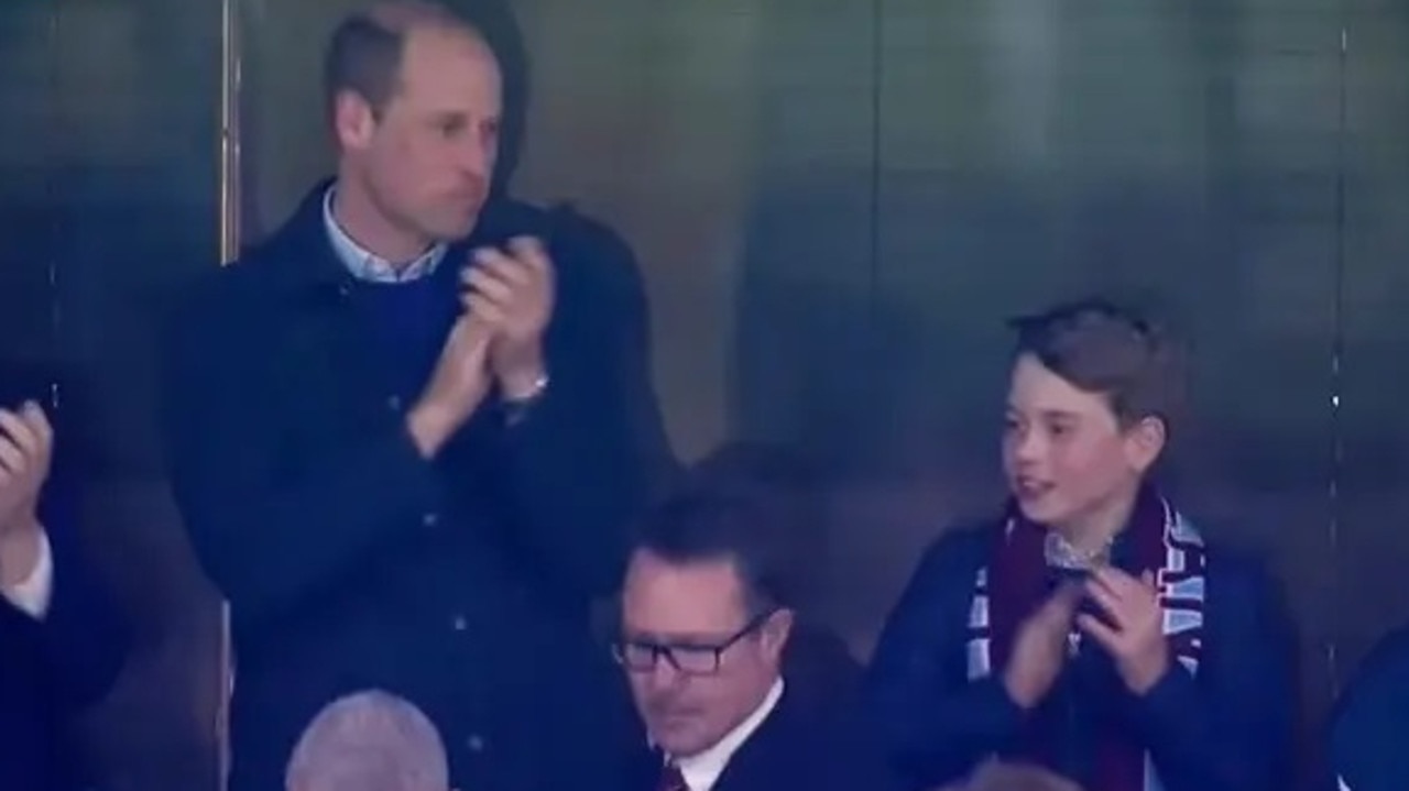 Father and son were thrilled when Aston’s Ollie Watkins scored the night’s first goal. Picture: TNT SPORTS 3/X