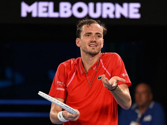 Russia's Daniil Medvedev reacts as he plays against Marcos Giron of the US during their men's singles match on day one of the Australian Open tennis tournament in Melbourne on January 16, 2023. (Photo by WILLIAM WEST / AFP) / -- IMAGE RESTRICTED TO EDITORIAL USE - STRICTLY NO COMMERCIAL USE --