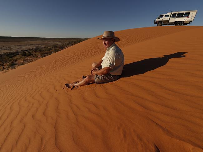  Martin Josselyn, Birdsville bakery owner and local tour operator, on top of the famous sand dune, Big Red, west of Birdsville.