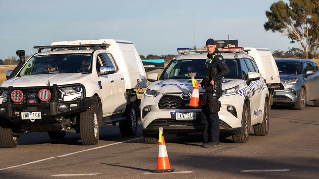 Police at the scene where two teenagers died after a dirt bike crash. Picture: Ian Currie