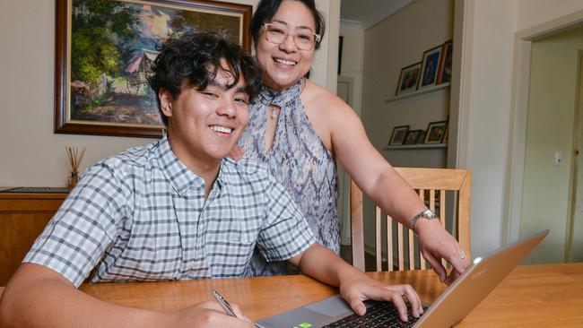 For SMARTdaily liftout - Nico Cacayorin and his mum Cherrie working on a resume at home, November 10, 2020. Picture: Brenton Edwards