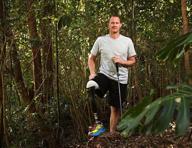 Troy Sachs at his home in Chatswood. He says he didn’t think he would change his disability if he had the chance. Picture: Adam Yip