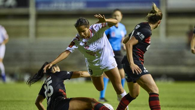 Adelaide United’s Mary Fowler of United is fouled by Western Sydney’s Alexandra Huynh at Marconi Stadium. Picture: Brett Hemmings/Getty Images