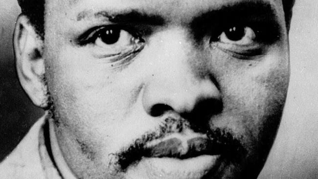 FILE-- Steve Biko, South Africa's Black pride leader who was killed in 1977, is seen in this undated file photo.  Police slammed Steve Biko�s head into a wall, chained him crucifixion style to a gate for 24 hours, then covered up the truth about his death, one of the officers admitted Sept. 10, 1997. Col. Harold Snyman, squirmed, stammered and looked anywhere but forward as he recounted the 1977 killing of the black pride leader in a bid to win amnesty from South Africa�s Truth and Reconciliation Commission. (AP Photo/FILE ).p//murders-south africa/racism/apartheid