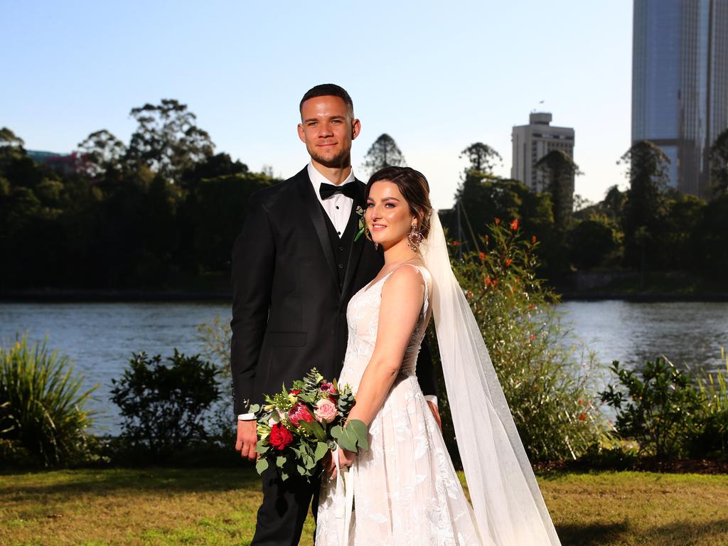 Bree Dobbins and Rayner Pukeroa from Brisbane had to bring their wedding forward and be married before today's 4pm lockdown began. Picture David Clark