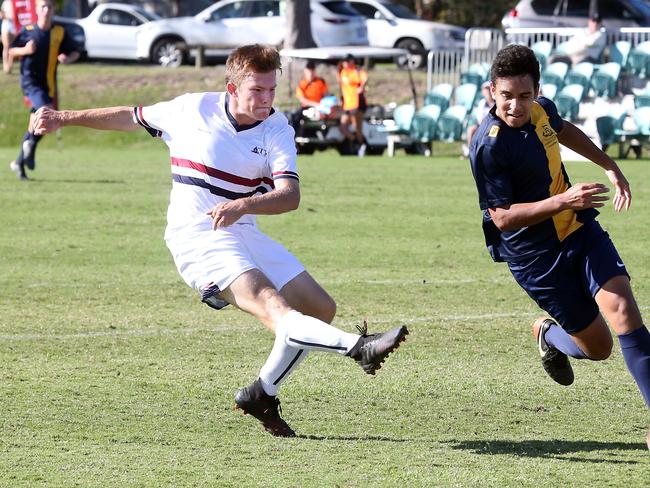 GPS first XI football (soccer) - The Southport School (white) vs. Toowoomba Grammar School from at Village Green, Winchester Street, Southport.Photo of Bedingfeld shooting at goal.Photo by Richard Gosling