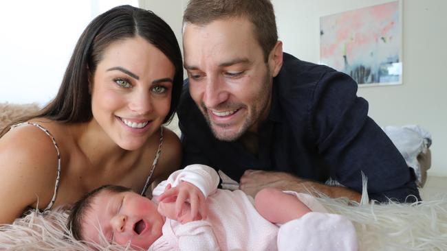 Sea FM announcer Dan Anstey and his wife Clare Anstey with their newborn baby daughter Halle on her first day home. Picture Glenn Hampson