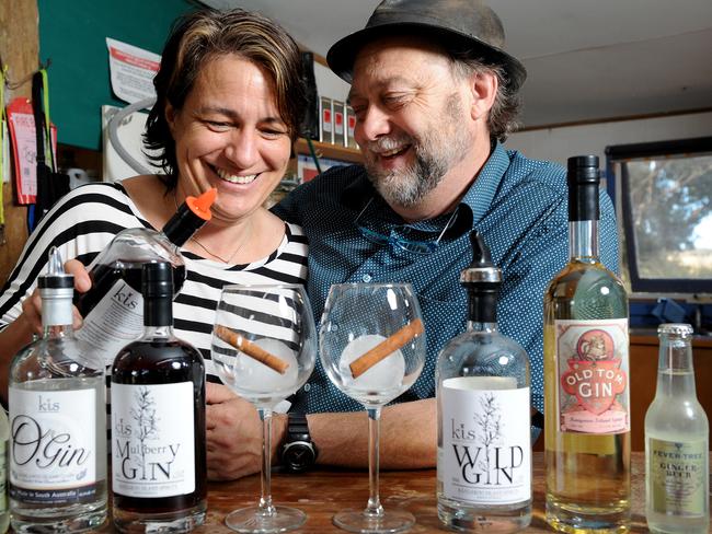 Kangaroo Island Spirits (KIS) owners Sarah and Jon Lark at their distillery with their award-winning O’Gin (left). Photo: Keryn Stevens