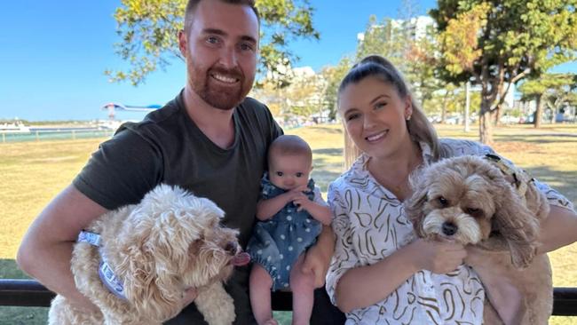 Gold Coast Division Seven candidate Joe Wilkinson, with his wife Annika, baby daughter Maisy, and "fur babies" Lola and Peach.