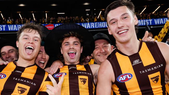 MELBOURNE, AUSTRALIA - SEPTEMBER 06: Jack Ginnivan, Nick Watson and Connor Macdonald of the Hawks pose for a photo during the 2024 AFL Second Elimination Final match between the Western Bulldogs and the Hawthorn Hawks at The Melbourne Cricket Ground on September 06, 2024 in Melbourne, Australia. (Photo by Dylan Burns/AFL Photos via Getty Images)