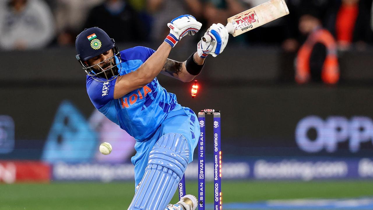 India's Virat Kohli is bowled no a free-hit ball during the ICC men's Twenty20 World Cup 2022 cricket match between India and Pakistan at Melbourne Cricket Ground (MCG) in Melbourne on October 23, 2022. (Photo by Martin KEEP / AFP) / -- IMAGE RESTRICTED TO EDITORIAL USE - STRICTLY NO COMMERCIAL USE --