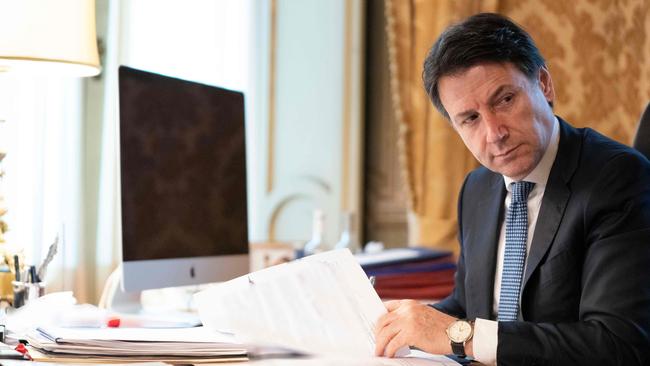 The Italian Prime Minister, Giuseppe Conte, takes part from his office in Rome in a video conference as part of an extraordinary meeting of G20 leaders. Picture: Palazzo Chigi press office via AFP