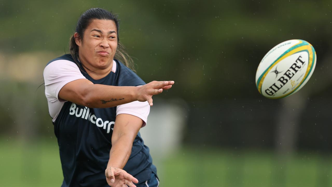 Rugby great Liz Patu works full-time as a Telstra customer service representative. Picture: Chris Hyde / Getty Images