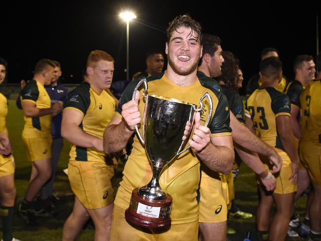 GOLD COAST, AUSTRALIA - MAY 04: Fraser McReight of Australia celebrates with the trophy after winning the Oceania Rugby U20 Championship match between Australia and New Zealand U20 at Bond University on May 04, 2019 in Gold Coast, Australia. (Photo by Albert Perez/Getty Images)