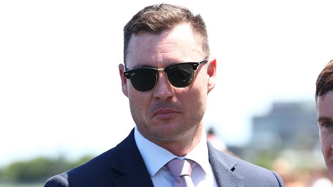 SYDNEY, AUSTRALIA - DECEMBER 23: Trainer Nathan Doyle celebrates after Chad Schofield riding Cripps Tonite wins Race 4 Midway during Sydney Racing at Royal Randwick Racecourse on December 23, 2023 in Sydney, Australia. (Photo by Jeremy Ng/Getty Images)