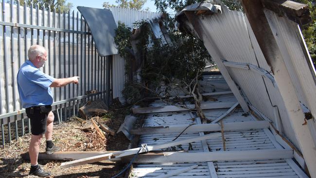 Gary Briggs with the roof ripped from the Dingo building