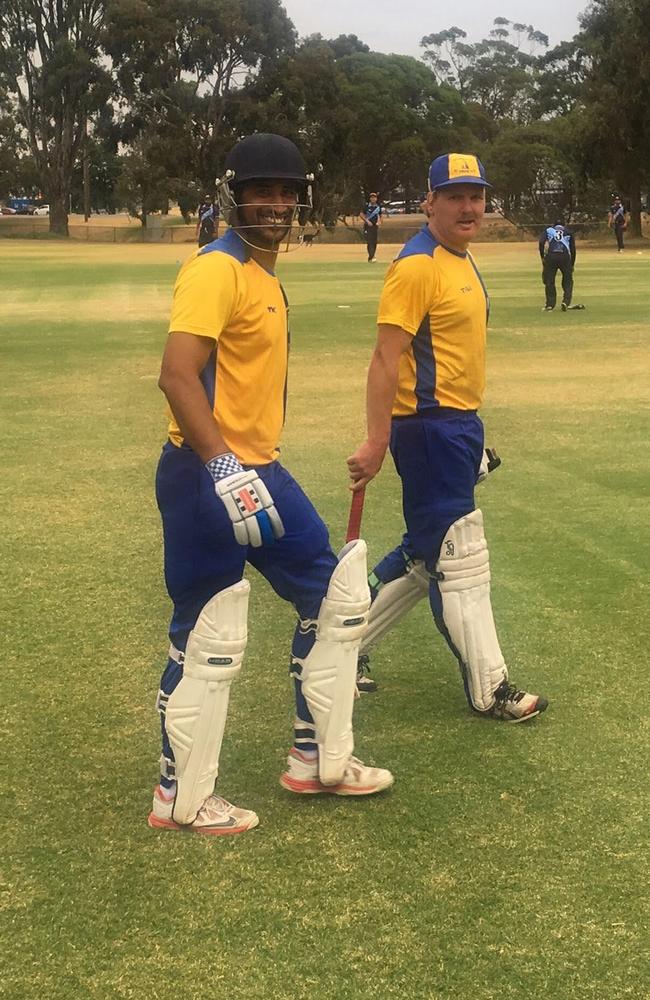 Vaib Deshpande and Mark Jamieson walk out to open the innings.