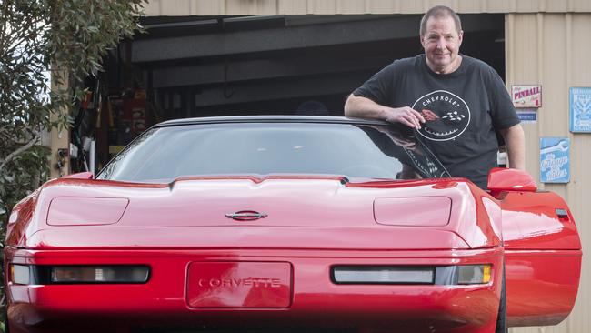 Dean Mundy with his left hand drive 1995 Corvette C4 at South Arm. Picture: Chris Kidd