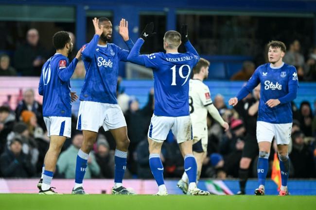 Everton striker Beto (2nd L) celebrates after scoring against Peterborough