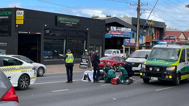 Paramedics are treating a pedestrian who was hit by a car on Magill Road at Norwood. It’s understood they were hit by a police car. Picture: 10 News First Adelaide