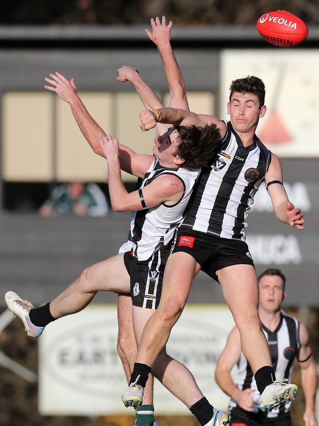 Euroa duo Jack Frewen and Jake Penman compete for the ball against Echuca.