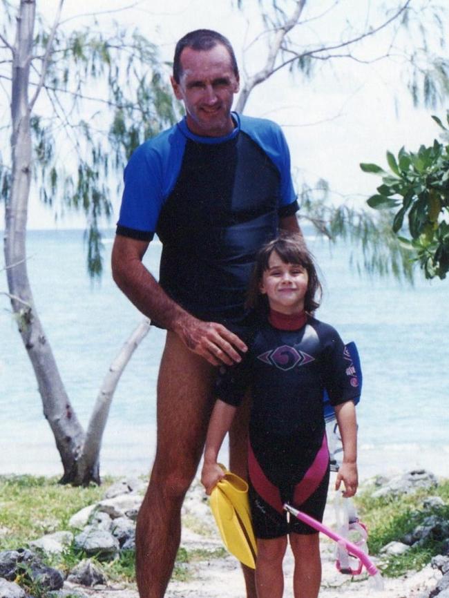 Amy Gash and Peter Gash snorkelling at Lady Elliot Island in 1997. Amy and her sister Chloe spent most of their childhood living on and exploring Lady Elliot Island. Picture: Supplied