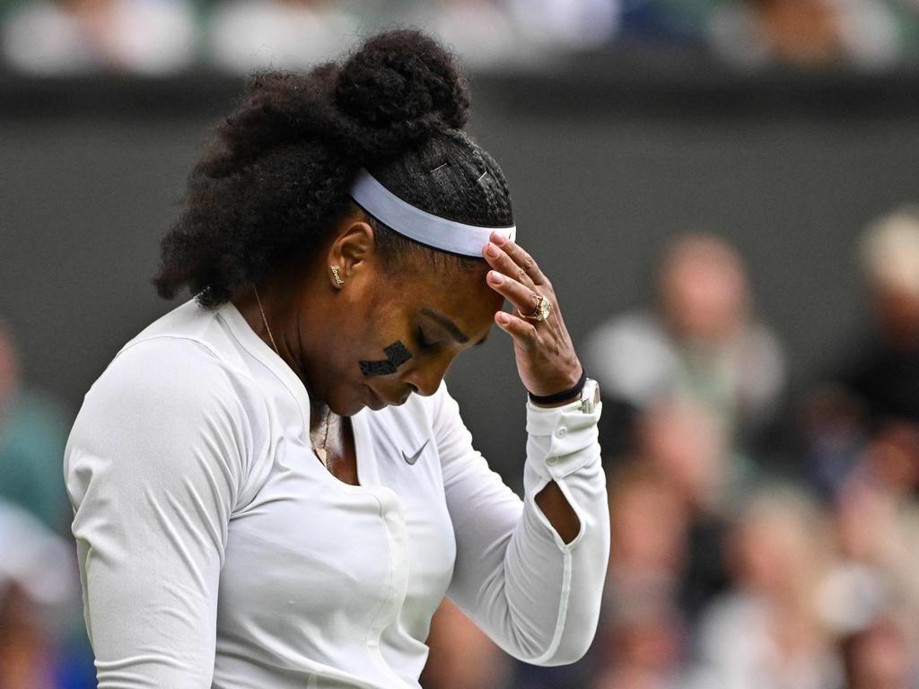 US player Serena Williams reacts after losing the first set against France's Harmony Tan at the 2022 Wimbledon Championships. Picture: AFP