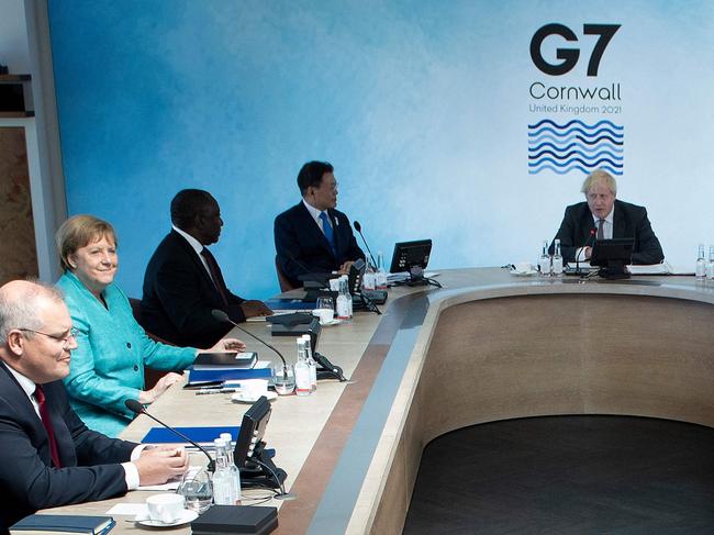 Scott Morrison, Angela Merkel, Cyril Ramaphosa, Moon Jae-in, and Boris Johnson, during a working session at the G7 summit. Picture: AFP