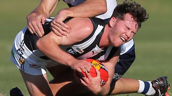 Ovens & Murray FNL, Round 3, Yarrawonga V Wangaratta, at Yarrawonga, Lachlan Howe, 12,  Yarrawonga Pigeons & Murray Waite, 22, Wangaratta Magpies,    Picture Yuri Kouzmin