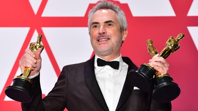 Best Director, Best Foreign Language Film, and Best Cinematography winner Alfonso Cuaron. Picture: AFP