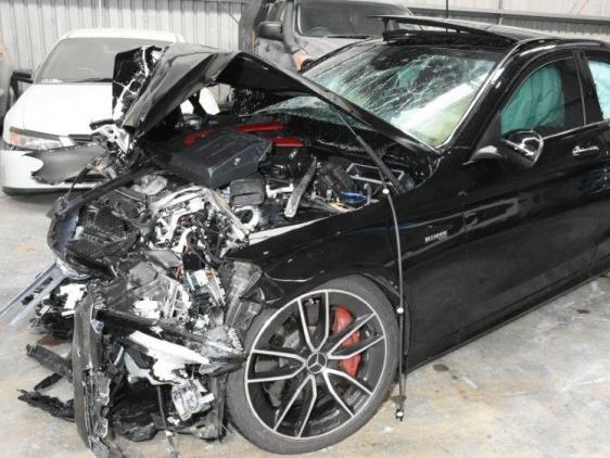 The $100,000 Mercedes was a write-off.