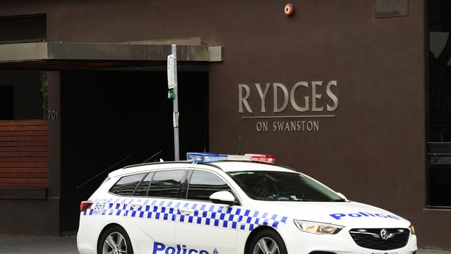 A police car sits outside the Rydges on Swanston hotel in Melbourne which is linked to being one of the sources of Victoria's coronavirus outbreaks. Picture: Getty Images