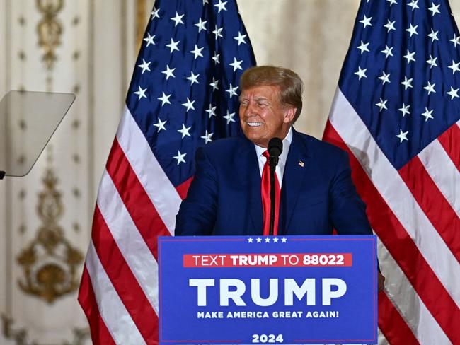 Donald Trump flashes a bright smile during his speech. Picture: AFP