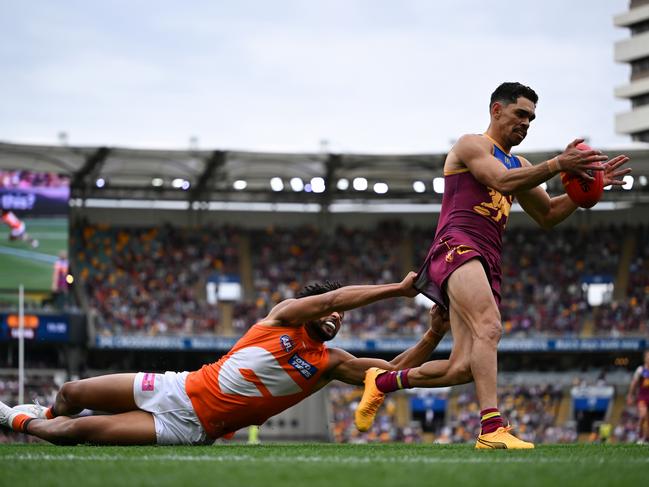 Charlie Cameron can’t get away from Connor Idun. Picture: Albert Perez/AFL Photos