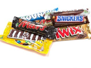 "Toronto, Canada - May 8, 2012: This is a studio shot of a variety of Mars, Incorporated chocolate products isolated on a white background."
