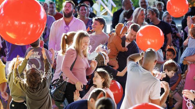 Queenslanders take part in the Bluey world record attempt for the biggest game of Keep Uppy at Southbank on Sunday morning. Picture Lachie Millard