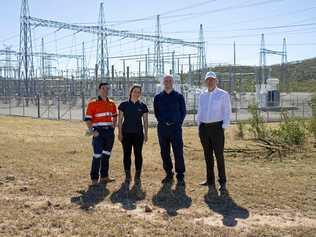 Representatives of the Clarke Creek Wind Farm project team. Goldwind Senior Development Manager Nam Quach, Goldwind Community Engagement Manager Sunny Rutherford, Lacour Energy Director James Townsend (left) and Goldwind Managing Director John Titchen at the  Clarke Creek Wind Farm. Picture: Contributed